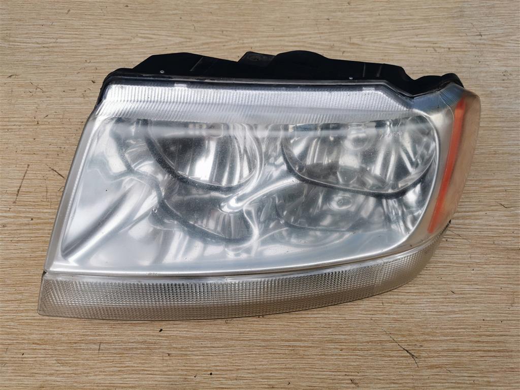 JEEP GRAND CHEROKEE (WJ) 1999-2004 для Фара левая