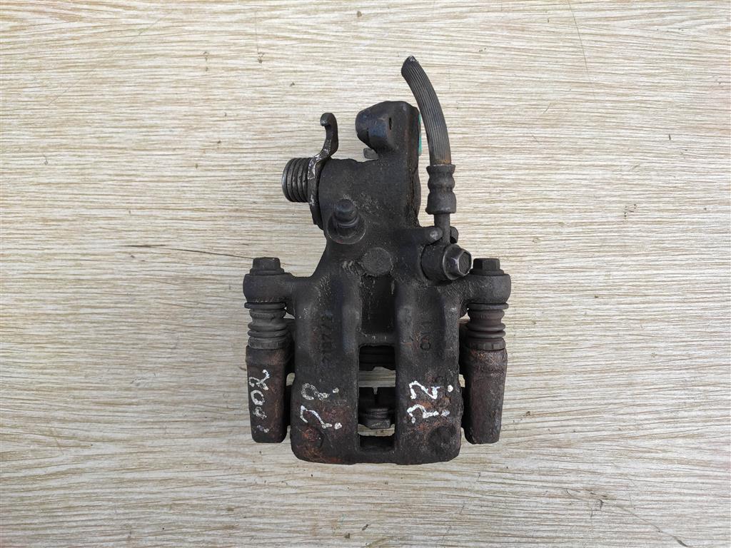 NISSAN ALMERA (N16) 2000-2006 для Суппорт задний левый