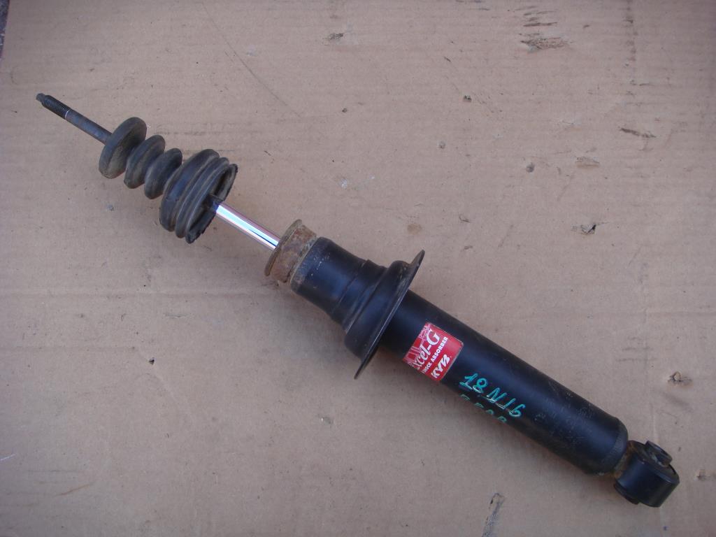 NISSAN MAXIMA (A32) 1994-2000 для Амортизатор подвески задний