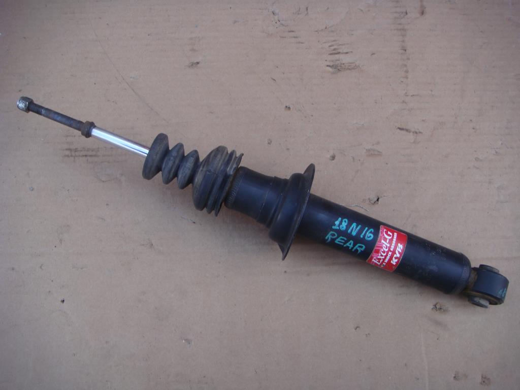 NISSAN MAXIMA (A32) 1994-2000 для Амортизатор подвески задний