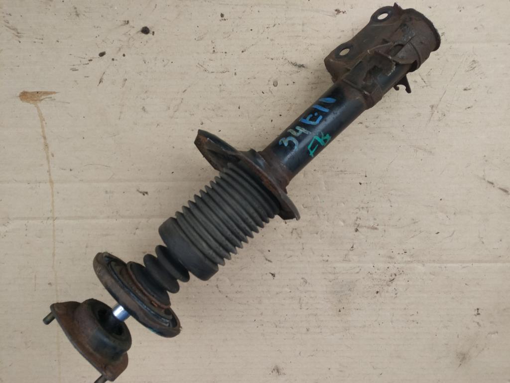 NISSAN ALMERA (N16) 2000-2006 для Амортизатор подвески передний левый