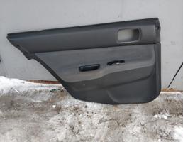 Обшивка двери задней левой для MITSUBISHI LANCER (CS) 2003-2008  запчасти бу