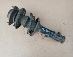 Амортизатор подвески передний левый для HYUNDAI ACCENT II (LC) 2000-  запчасти бу